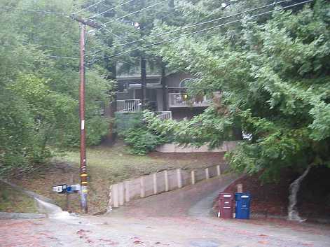 storm runoffs flowing onto the end of Meadow Dr.