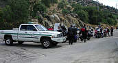 [button photo of group stopped to ask about road closures at Yosemite, CA]