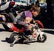 [button photo of boy racer in Laguna Seca, CA pit area]